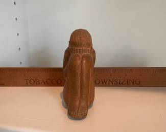 C53 - $10. Hand Carved Weeping Man. Measures 4.25" Tall