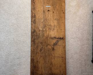 C10 - $30. Carved Relief Wall Art. Measures 12" x 27.5" tall.