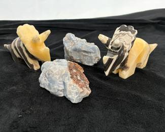 Carved Zebra Calcite Dinosaurs