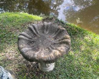 Small concrete birdbath