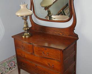 Antique dresser with swing mirror