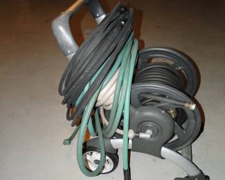 Hose with carrier