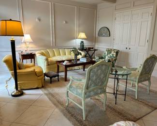 Lovely living room with sets of French style chairs, a fabulous Boden tufted sofa with goose down cushion , antelope rug and more