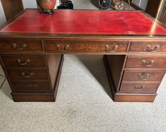 Handsome red leather top partners desk