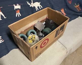Assorted Skateboard Wheels and Trucks Including Powell Peralta, OJ, and Enuff