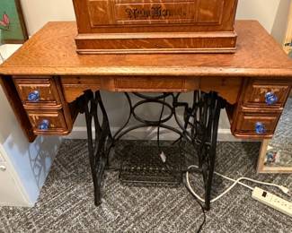 New Home New Home Treadle Sewing Machine with Oak Cabinet
