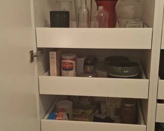 Assorted Pantry Items and Glassware in Cabinet with PullOut Drawers