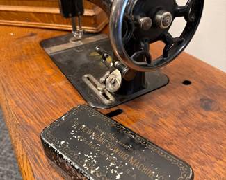 New Home New Home Treadle Sewing Machine with Oak Cabinet fifth image
