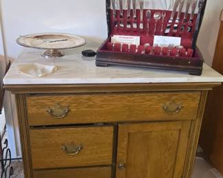 Marble top oak cabinet