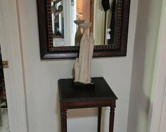 Austin statue, antique table