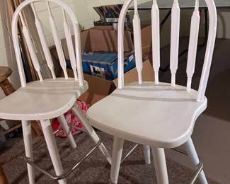 White swivel bar height chairs