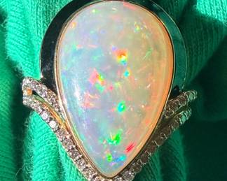 Huge opal diamond and gold ring