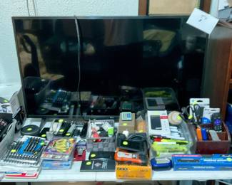 Office supplies, one of several TVs 