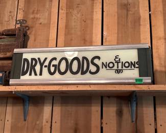 DRY GOODS SIGN