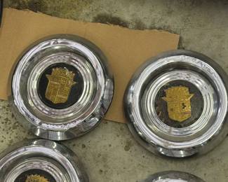SET OF VINTAGE CADILLAC HUBCAPS