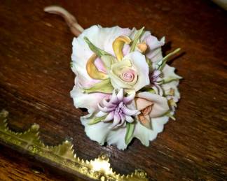 <uch porcelain, china, glassware, pottery and stoneware. Capodimonte porcelain flower