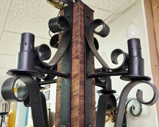 Great selection of cast and wrought iron items. Spanish Revival style hanging light forged with iron arms