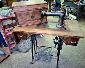Sewing and related items.  Antique Wheeler and Wilson treadle sewing machine 