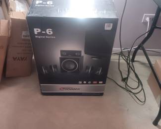 new in box surround sound speaker set