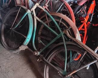 several vintage bicycles