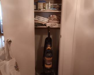 vacuum, towels, toiletries