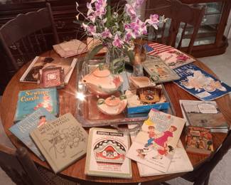 antique round oak table, vintage children's books , Hull Woodland tea set