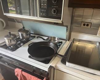 Large cast-iron skillet, Farberware pots and pans