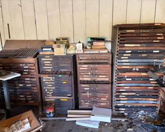 Antique wooden printer's type cabinets - all filled with metal type for letterpress printing