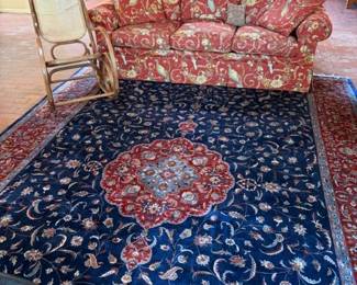 Sofa, rug and vintage Bentwood rocker