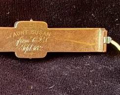 Verso of 'Gold Rush' brooch with 1882 inscription