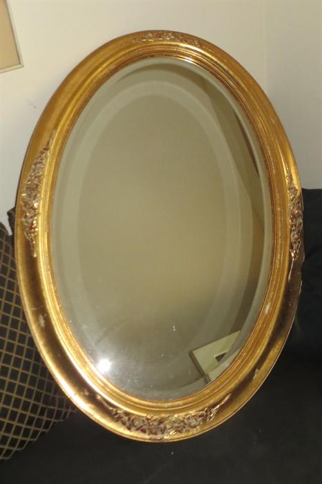 Large beveled oval mirror