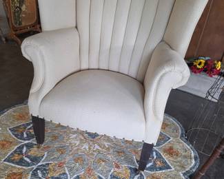 Channel Tufted Wingback Armchair with Brass Casters
