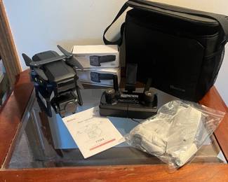 Bwine F7GB2 foldable drone kit featuring a 4K camera and a 3-axis gimbal. Includes remote controller, phone holder, and carrying bag.