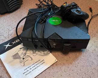 Vintage Microsoft Xbox console, original model released in 2001, standard “The Duke” controller