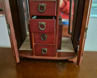 Lot 61: Small wooden jewelry armoire with mirrored doors and five drawers