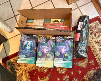 Lot 38: Pool Inflatable Lights, Water Toys, and Apples to Apples Board Game