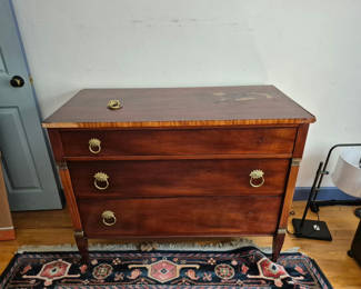 Lot 44: Three-drawer wooden dresser with brass ring pulls