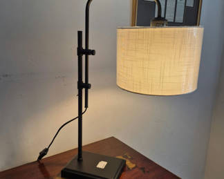 Lot 43: Arc-style black metal desk lamp with fabric shade