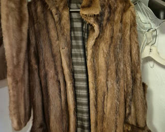 Lot 99: Two brown fur coats