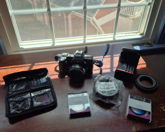 Lot 41: Minolta 7000 Maxxum Camera with Accessories and Lenses