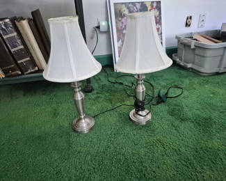 Lot 48: Four pairs of silver metal table lamps with white shades