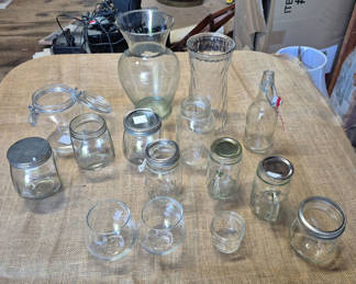 Lot 12: Assorted Clear Glass Jars, Bottles, Vases, and Drinking Glasses