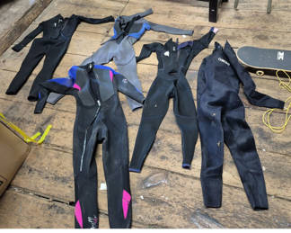 Lot 7: Assorted Collection of Wetsuits