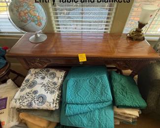 Side Wooden Table and Miscellaneous Bedding