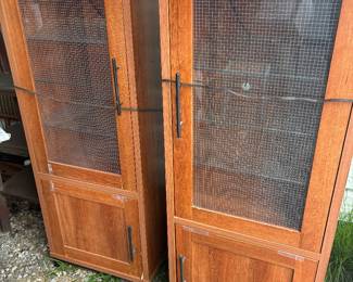 Set of two lighted cabinets with interior glass shelves
