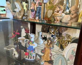 Assorted Decorative Figurines and Collectibles, including Religious and Whimsical Themes