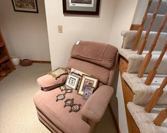 Pink La-Z-Boy Recliner with Decorative Frames and Pictures