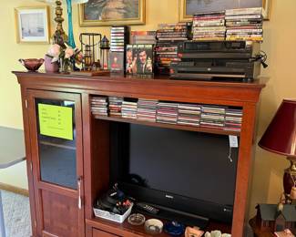 Wooden Media Console with Electronics and Media Collection