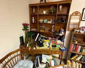 Wooden Hutch with Assorted Decorative Items and Books