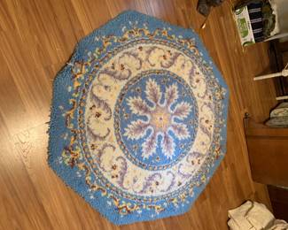 #67 hooked blue gold rug 48 round $30.00